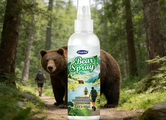 A Bear Spray bottle stands on a forest trail with a large brown bear behind it and a hiker walking in the distance, the label reading Gentle Formula, suitable for various bears and forests, 100 ml.