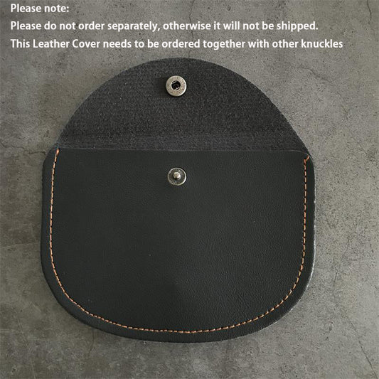 Knuckle dusters leather case with the flap lifted, showing the suede underside, snap socket and body stud