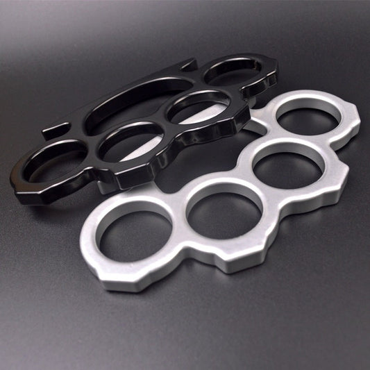 Black and silver knuckle dusters displayed together