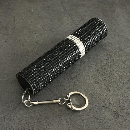 Black rhinestone mini stun gun keychain showing clasp and crystal band detail