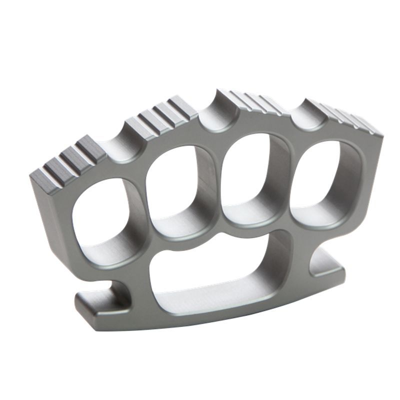 Silver 440c steel four-hole knuckle duster with horizontal grooved top bar on white background.