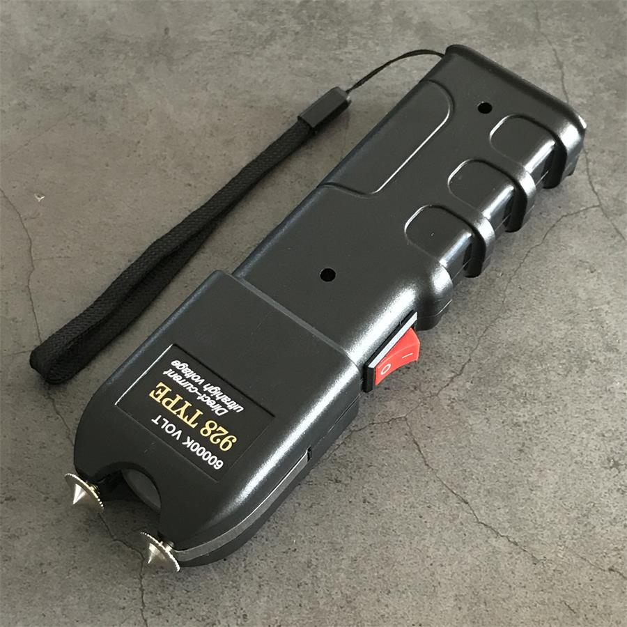 Single black 60000K 928 device side view with wrist lanyard