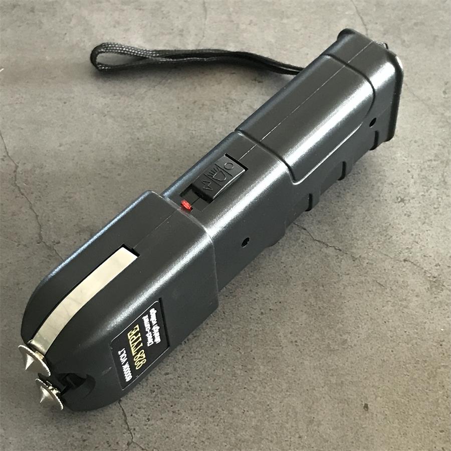 60000K 928 device side view showing charging port and red switch