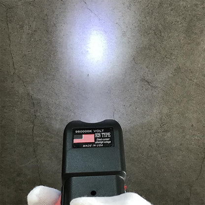 980000K 928 device top with LED beam shining upward on concrete