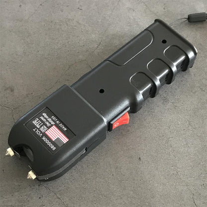 980000K 928 device side view with black lanyard on concrete