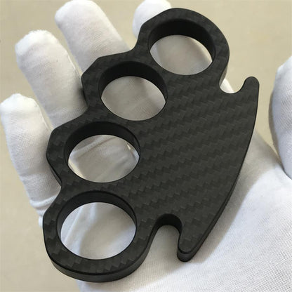 Classic Carbon Fiber Knuckle Duster in white glove