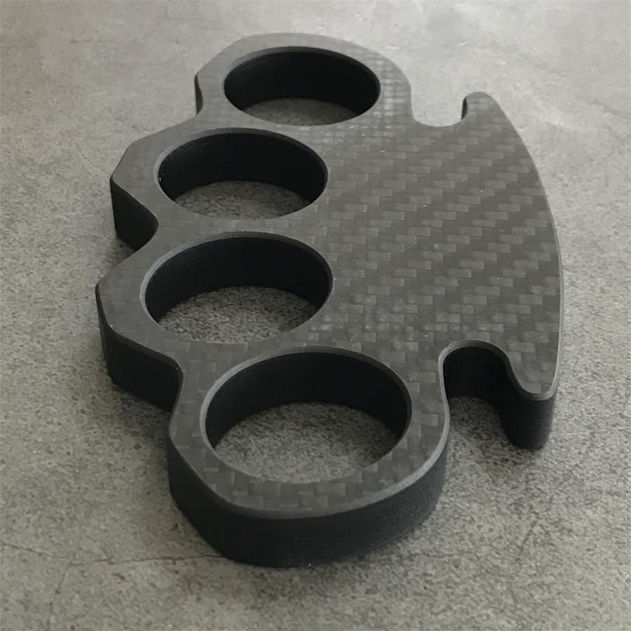 Classic Carbon Fiber Knuckle Duster shown at side