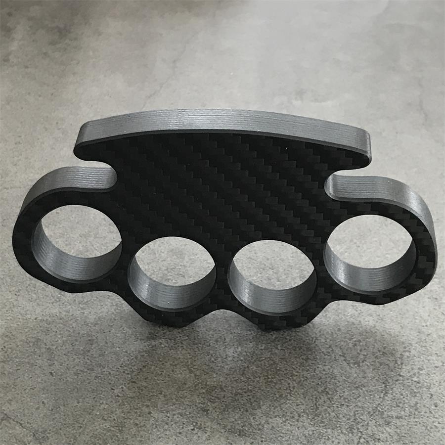 Classic Carbon Fiber Knuckle Duster placed upside down