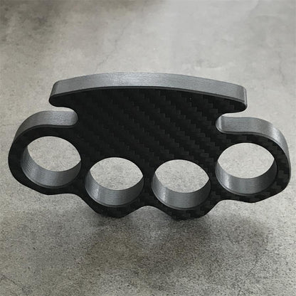 Classic Carbon Fiber Knuckle Duster placed upside down