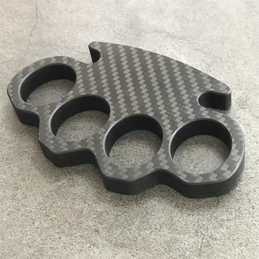 Classic Carbon Fiber Knuckle Duster at slight angle