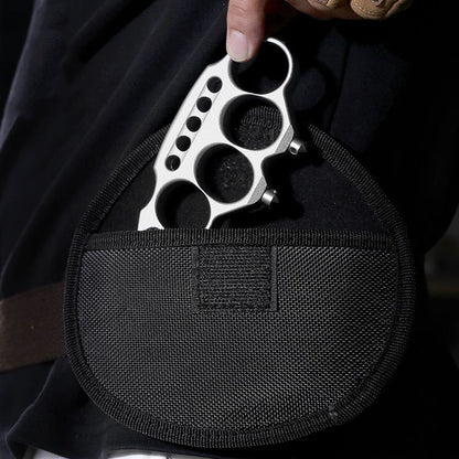 Gloved hand holds zinc alloy duster on mesh bag