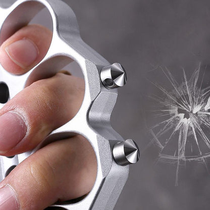 Hand gripping zinc alloy knuckle duster with spark
