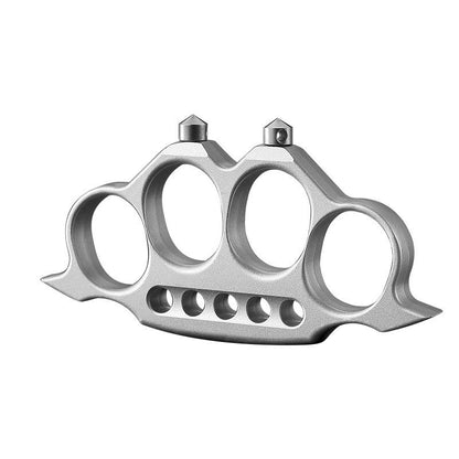 Creative zinc alloy knuckle duster on white background
