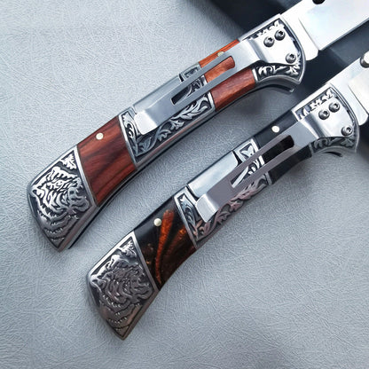 Carved folding knife pair