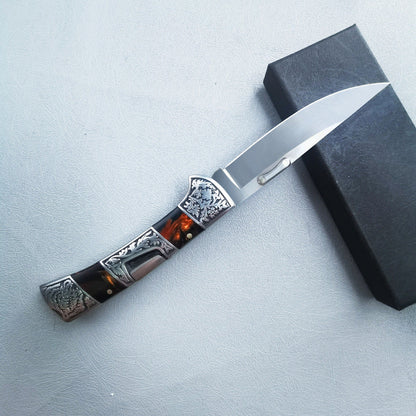 Carved folding knife profile