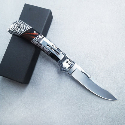 Carved folding knife open