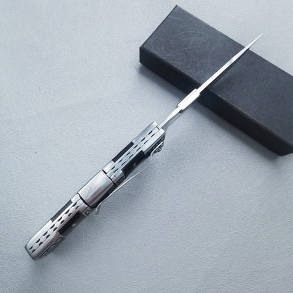 Carved folding knife upright