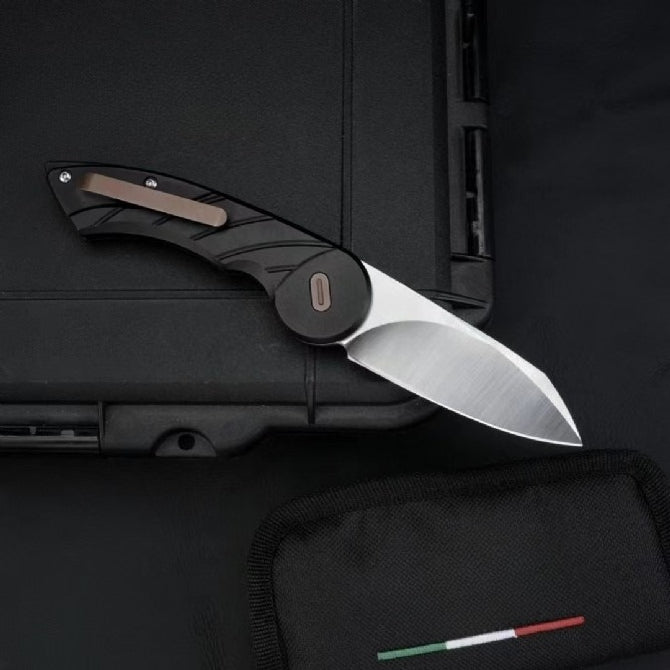 Forged M390 Outdoor CNC Machining Knife — grip and handle close-up.