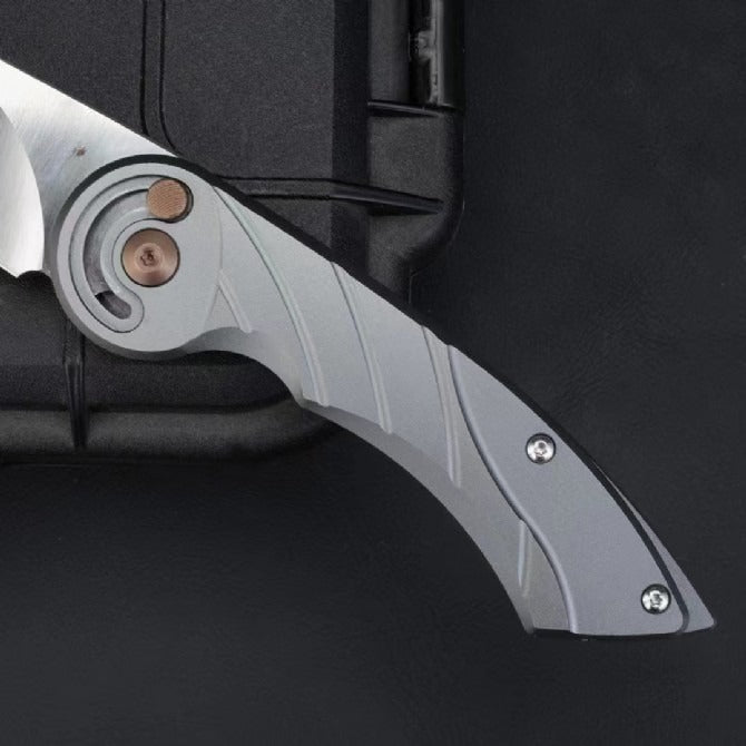 Forged M390 Outdoor CNC Machining Knife — lifestyle shot in an outdoor setting.