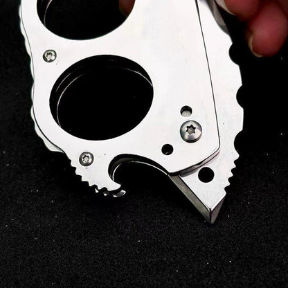 Stainless steel Mini Knuckle Knife lying flat