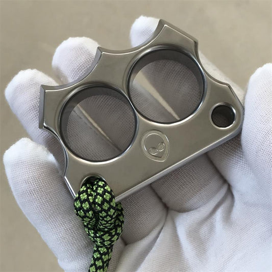 Mini 316 Steel Alien Knuckle Duster in glove