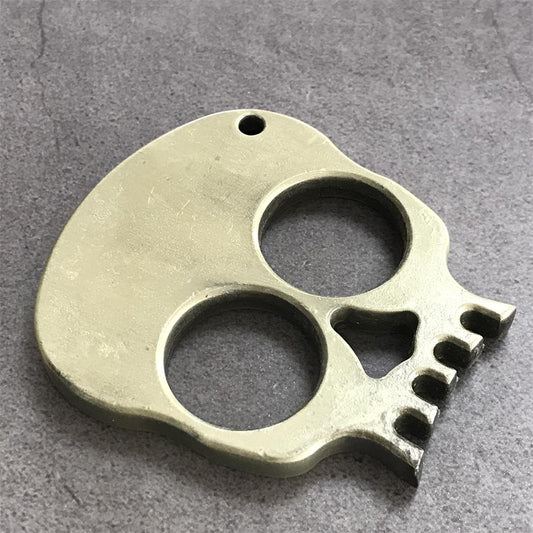 Skull Two-Finger Knuckle Duster on stone