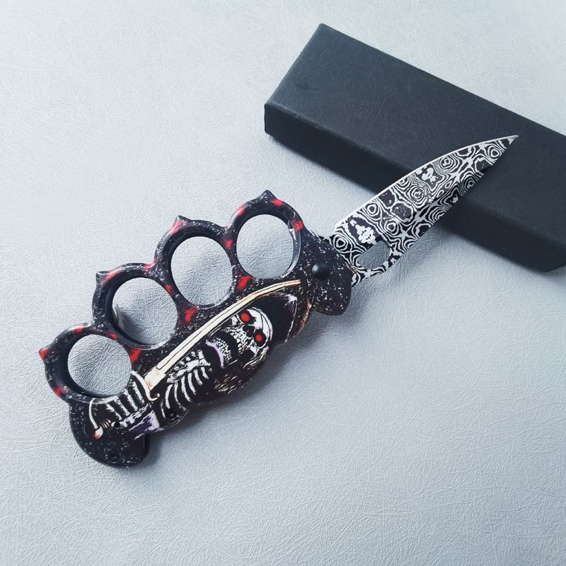 EDC pocket knife posed in a handheld carry shot