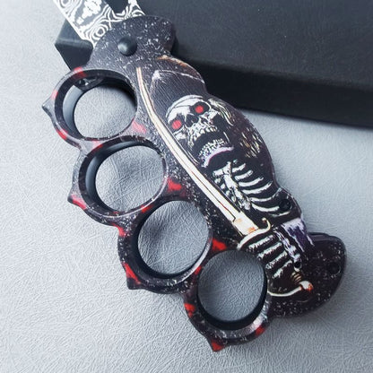 Folding EDC knife laid beside a scale reference