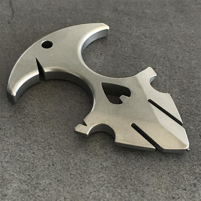 TC21 titanium knuckle duster on grey stone