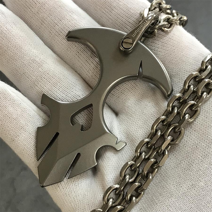 Holding TC21 titanium knuckle duster with chain