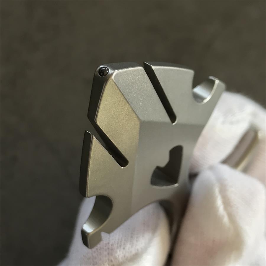 TC21 titanium knuckle duster held