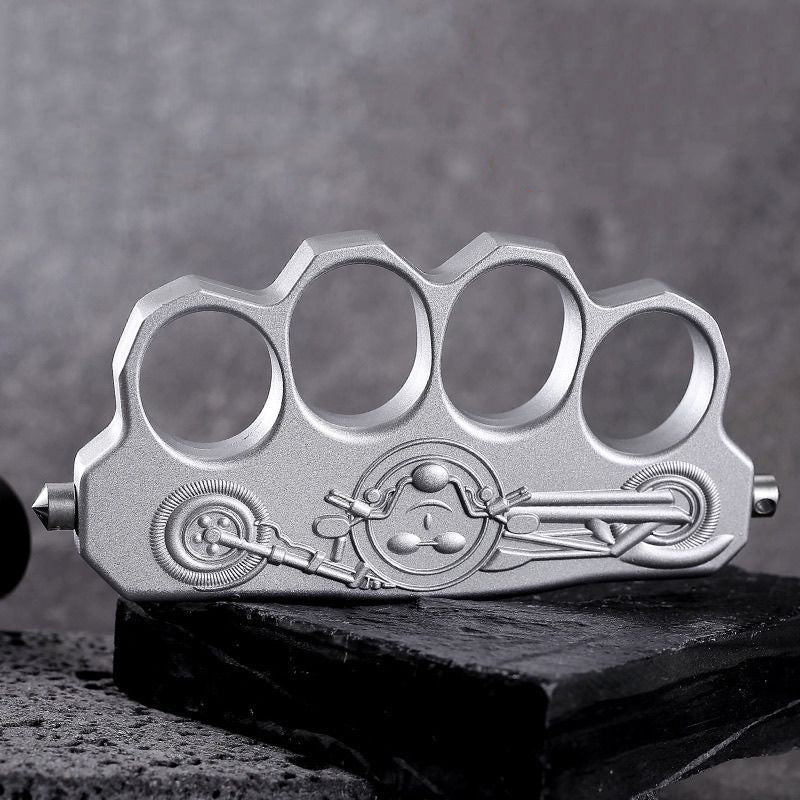 Thickened zinc alloy knuckle duster on dark stone