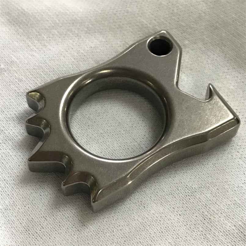 Hedgehog Knuckle Duster lying flat on white cloth