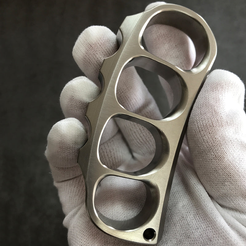 Holding titanium knuckle duster front view