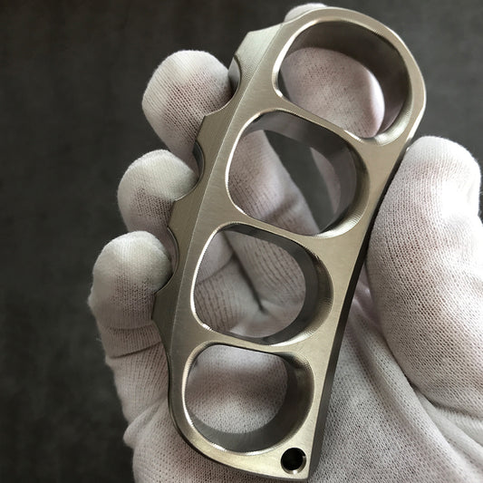 Holding titanium knuckle duster front view