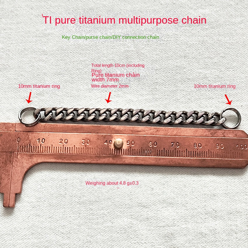 Pure titanium chain laid next to a copper caliper with text overlay: total length 10cm, width 7mm, wire diameter 2mm, weight about 4.8g.