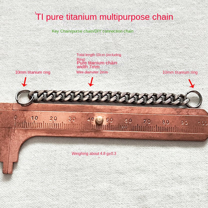 Pure titanium chain laid next to a copper caliper with text overlay: total length 10cm, width 7mm, wire diameter 2mm, weight about 4.8g.