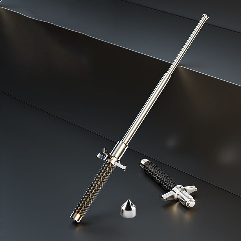 Extended aviation alloy steel baton with detached glass-break cap and collapsed handle on a dark surface