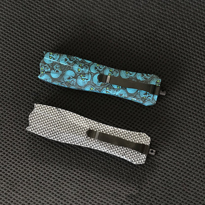 Blue floral handle EDC knife folded closed showing pocket clip