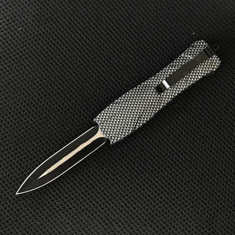 Gray carbon fiber patterned pocket knife side view