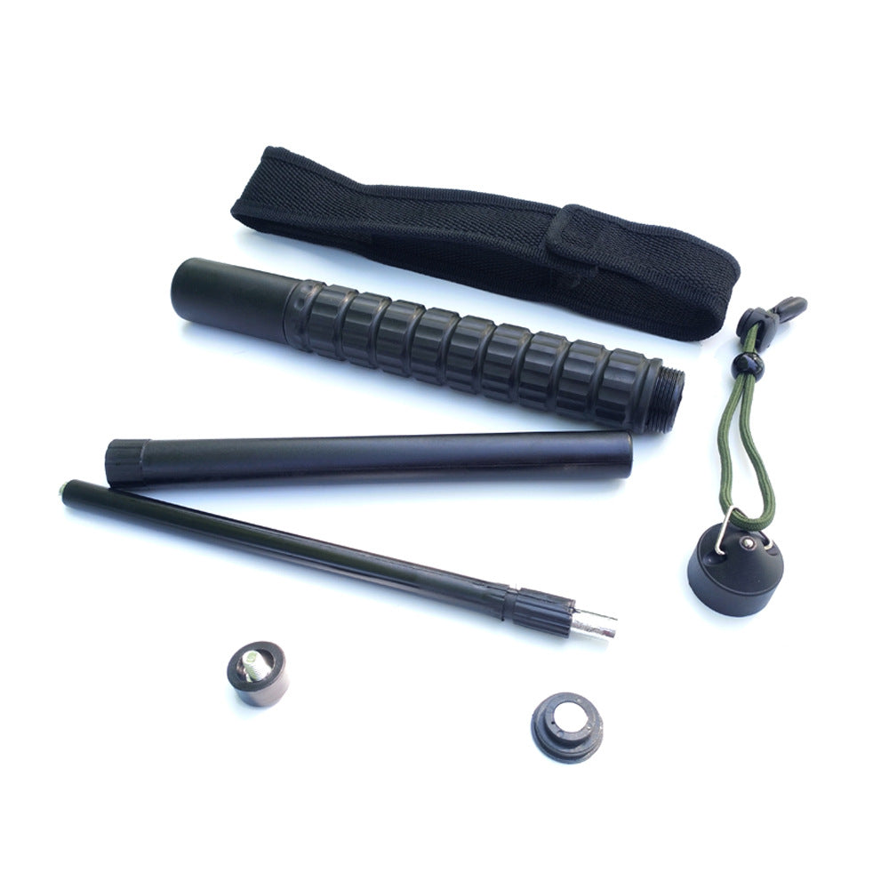 Baton taken apart into the handle, two metal shafts, cone cap, and inner parts