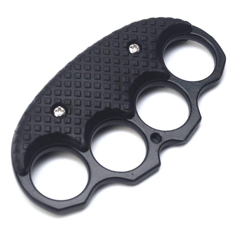 Side view of the all-black covered EDC knuckle duster on a white background.