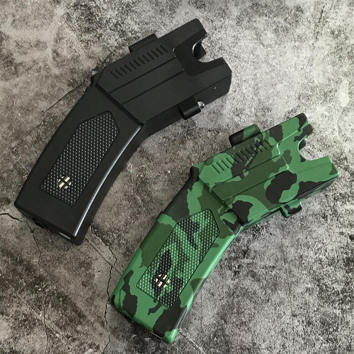 Black and green camouflage stun gun units angled to show the head notch, top vents and textured grips with the cross emblem