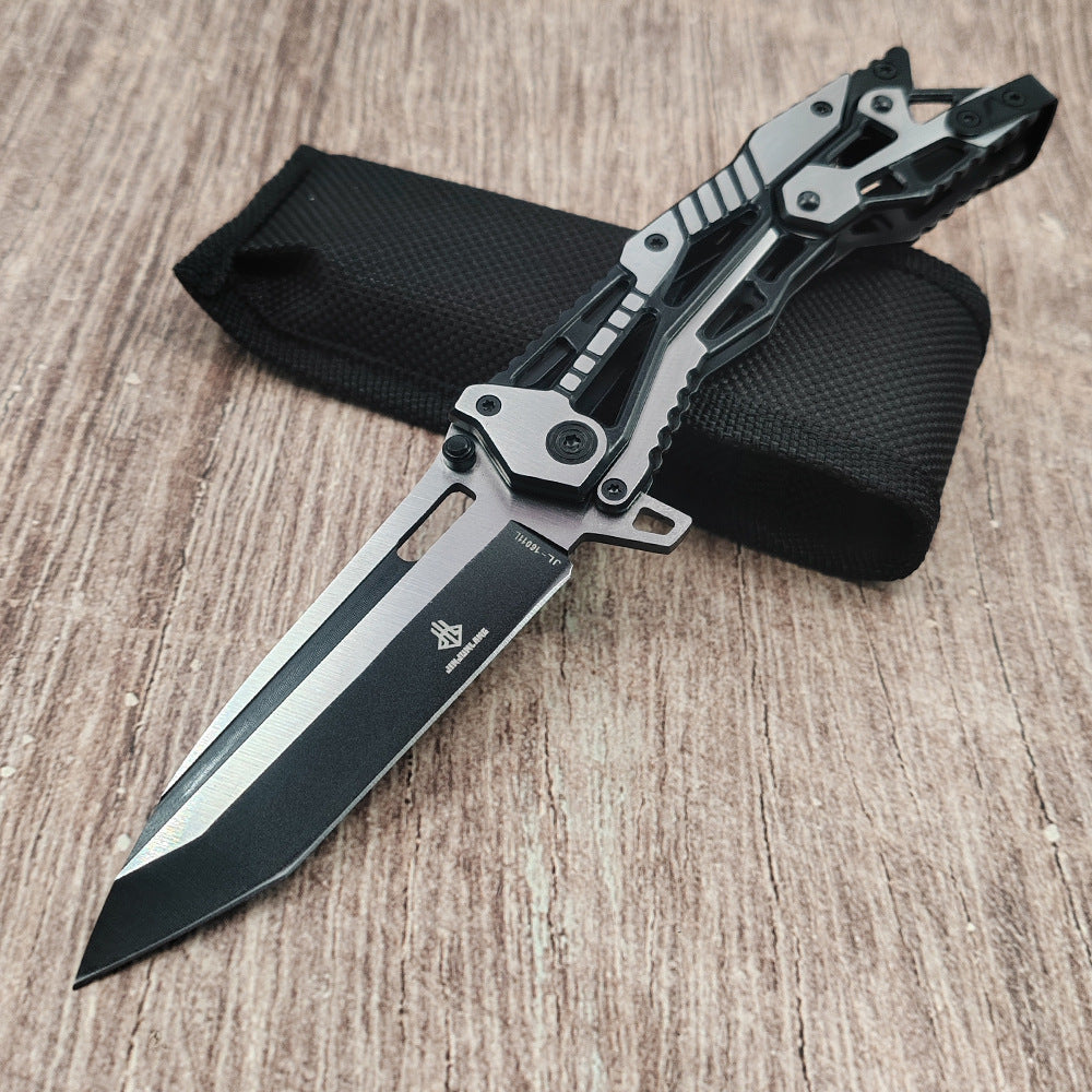 Black and silver all-steel folding knife with black pouch on wood surface