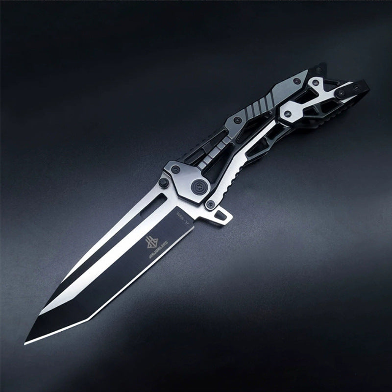 Black and silver all-steel folding knife open on dark background