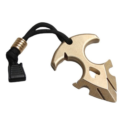 Brass anchor pendant on a white background with its black lanyard, brass bead and cord lock laid out to the left.