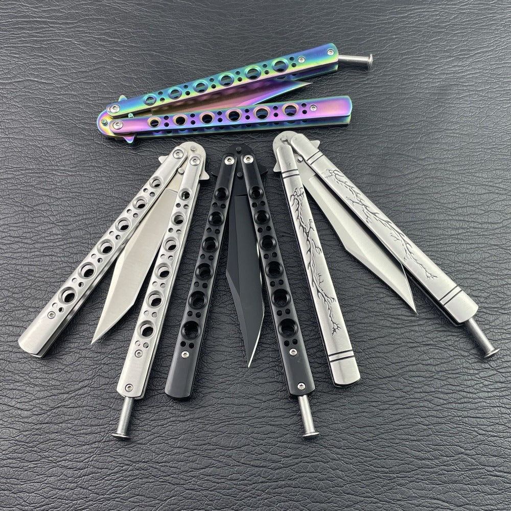 Four unsharpened butterfly trainers in fan circle with three open and one folded