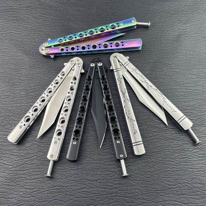 Four unsharpened butterfly trainers in fan circle with three open and one folded