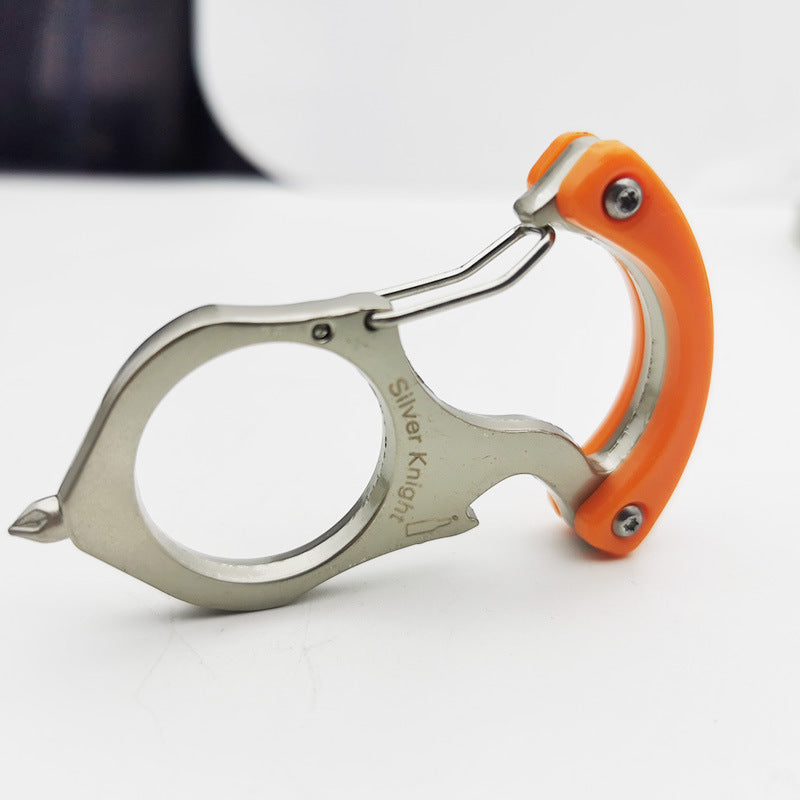 Orange handled carabiner keychain tool lying flat on a white surface, Silver Knight engraving readable beside the bottle opener notch, spring gate at the top