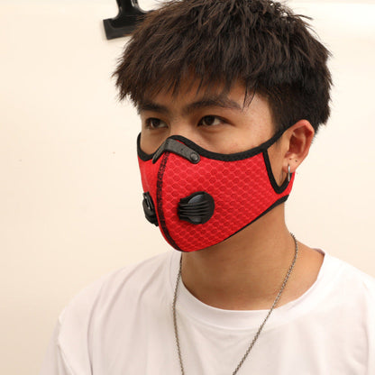 Side view of a man in a white t-shirt wearing the red mesh cycling mask with black valve